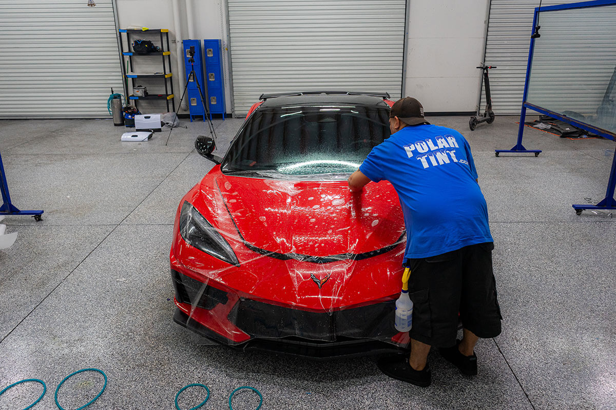 Full Front PPF installation covering full hood, fenders, mirrors and bumper on a luxury sedan in southwest Las Vegas Valley